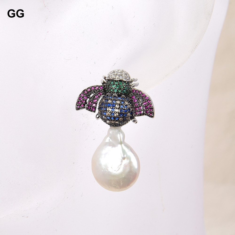 أقراط مرصعة بالزركون من GuaiGu - مراجعة Ethnic Fashion Co In وسعره