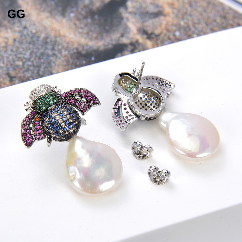 أقراط مرصعة بالزركون من GuaiGu - مراجعة Ethnic Fashion Co In وسعره