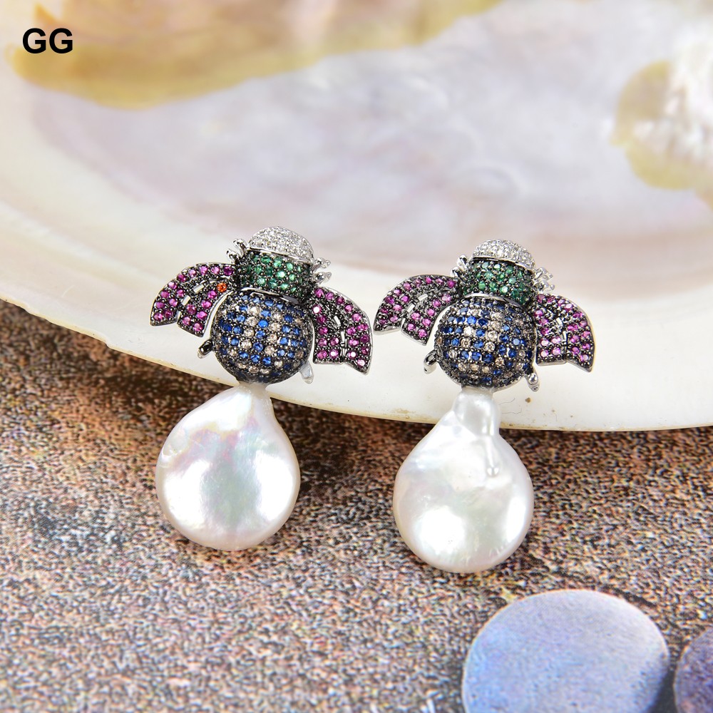 أقراط مرصعة بالزركون من GuaiGu - مراجعة Ethnic Fashion Co In وسعره